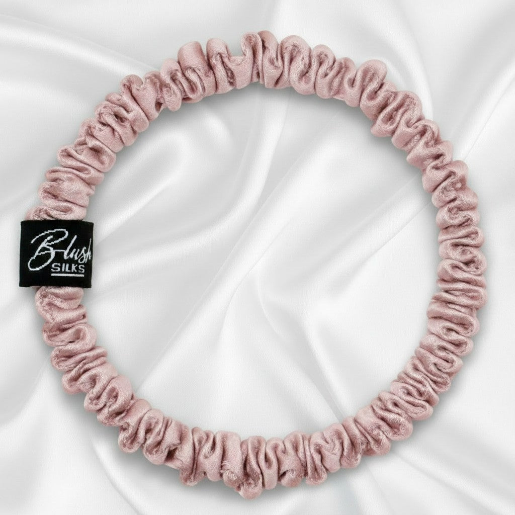 Blush pink mini pure mulberry silk scrunchie for a gentle, damage-free pink hair accessory.