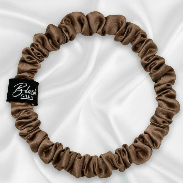 Deep chocolate brown mini pure mulberry silk scrunchie for a gentle, no-crease hold.