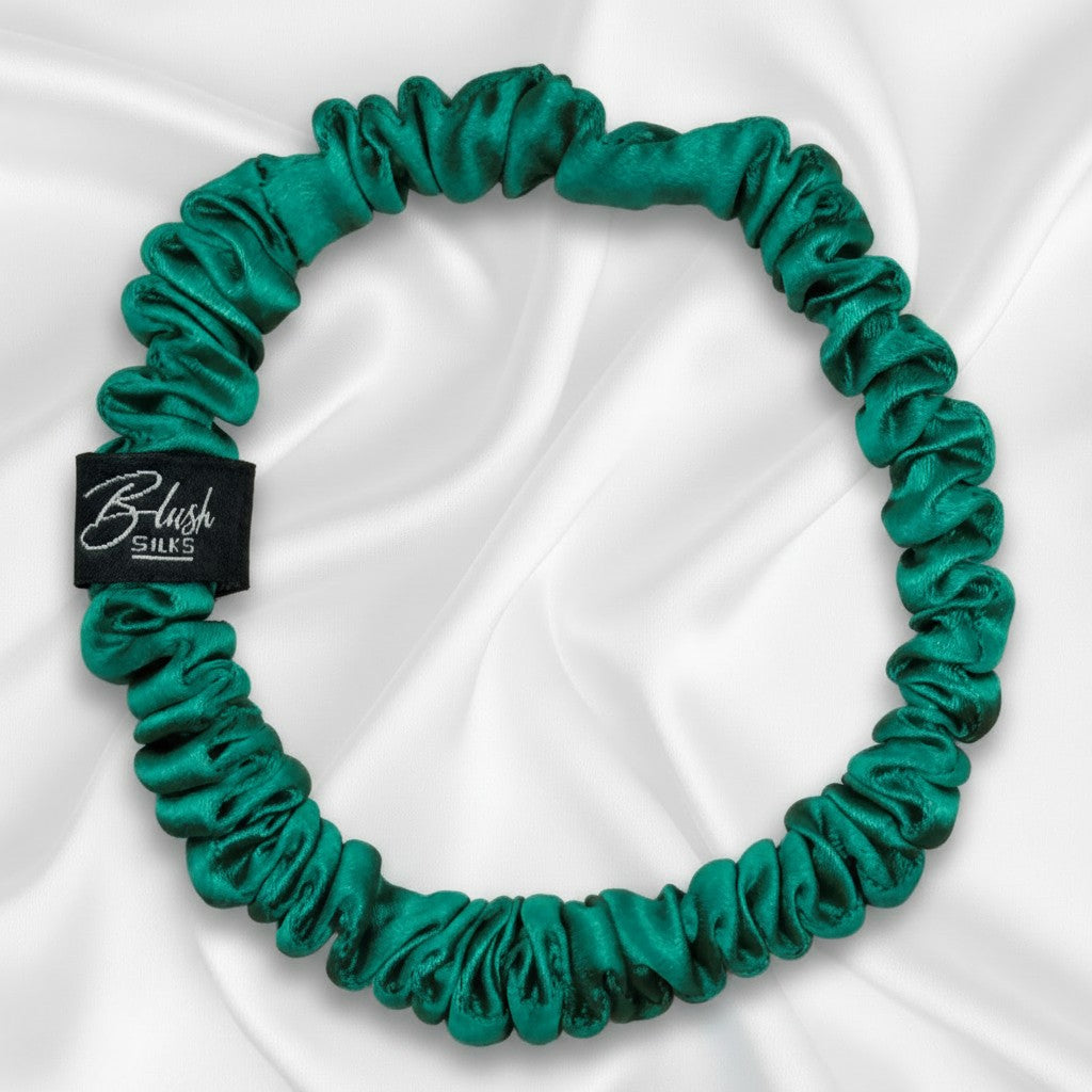 Serene jade green mini pure mulberry silk scrunchie for a balanced, damage-free neutral green hairstyle.
