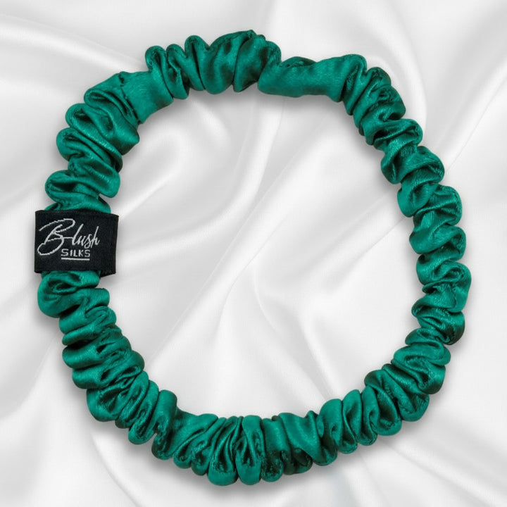 Serene jade green mini pure mulberry silk scrunchie for a balanced, damage-free neutral green hairstyle.