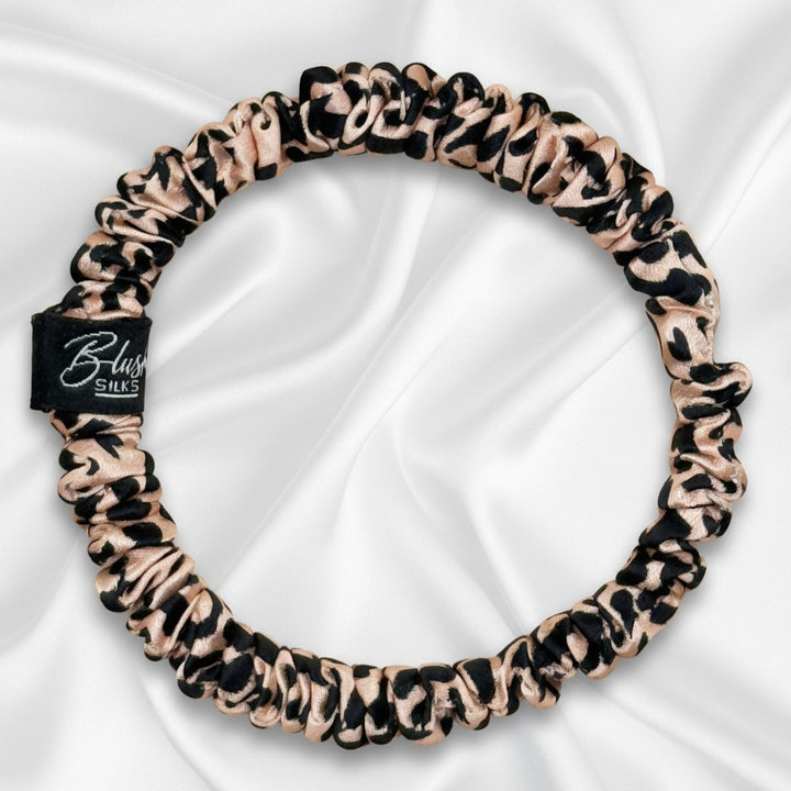 Pink leopard print mini pure mulberry silk scrunchie for a stylish, damage-free animal print hairstyle.