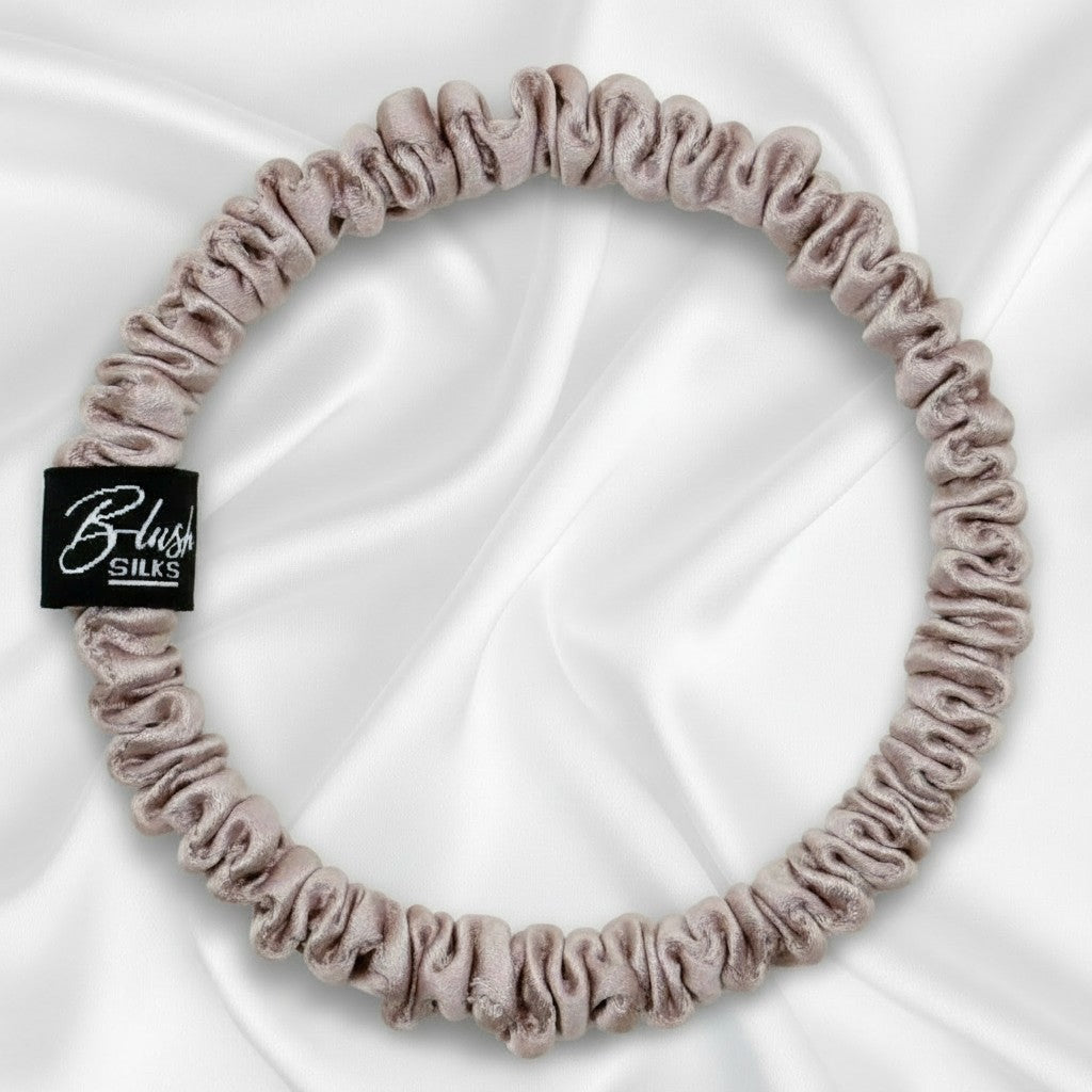 Lotus pink mini pure mulberry silk scrunchie for a gentle, damage-free hairstyle.