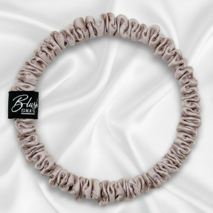 Lotus pink mini pure mulberry silk scrunchie for a gentle, damage-free hairstyle.