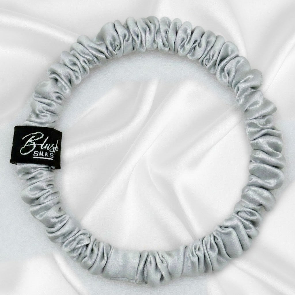 Luminous pewter grey mini pure mulberry silk scrunchie for a sleek, damage-free metallic hairstyle.