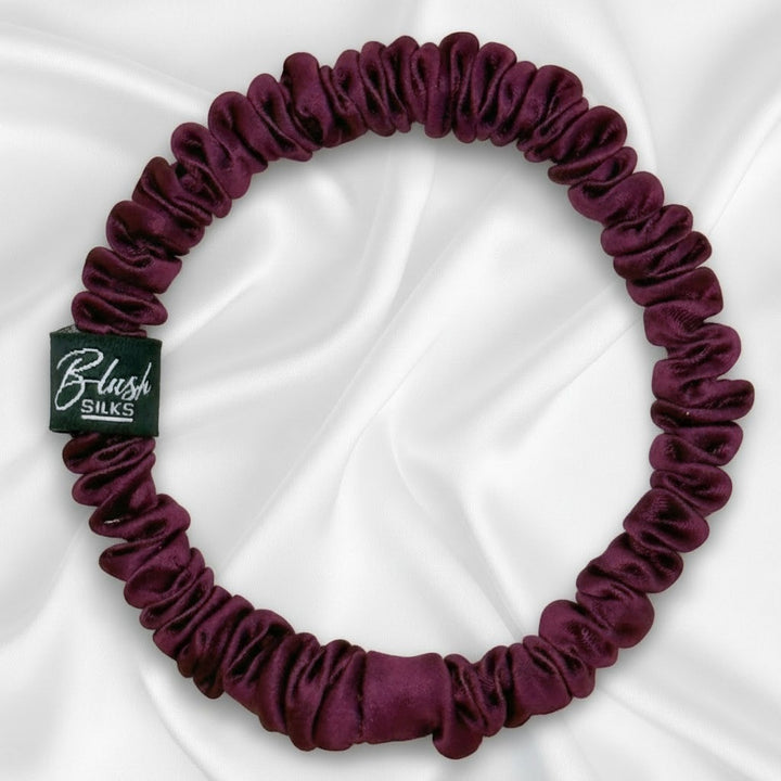 Deep sangria wine mini pure mulberry silk scrunchie for a luxurious, damage-free dark red hairstyle.