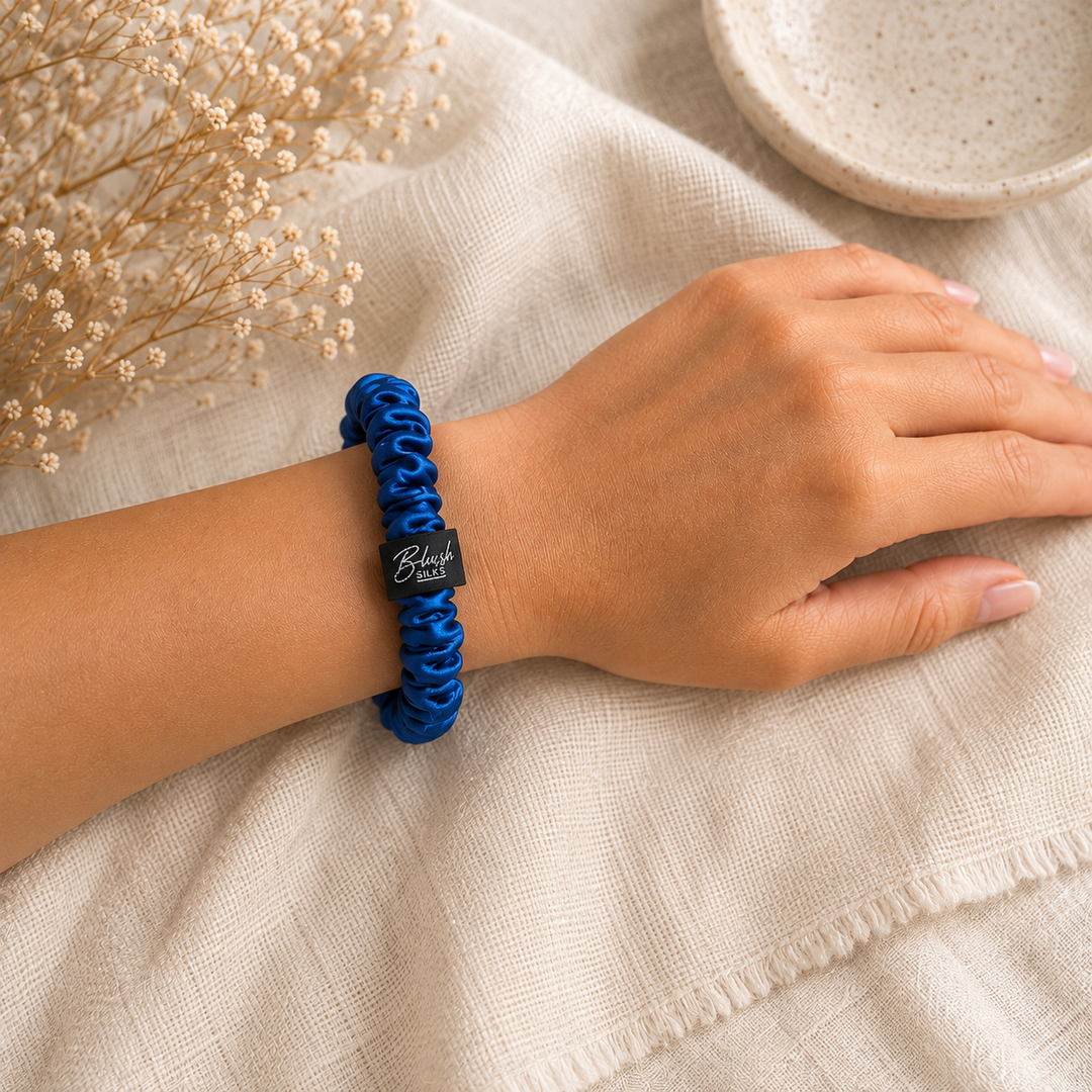 Cobalt Blue 100% mulberry silk mini scrunchie worn on wrist