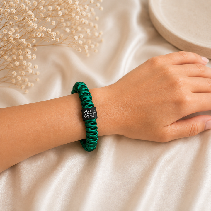 Blush Silks Emerald Green 100% mulberry silk mini scrunchie worn on wrist