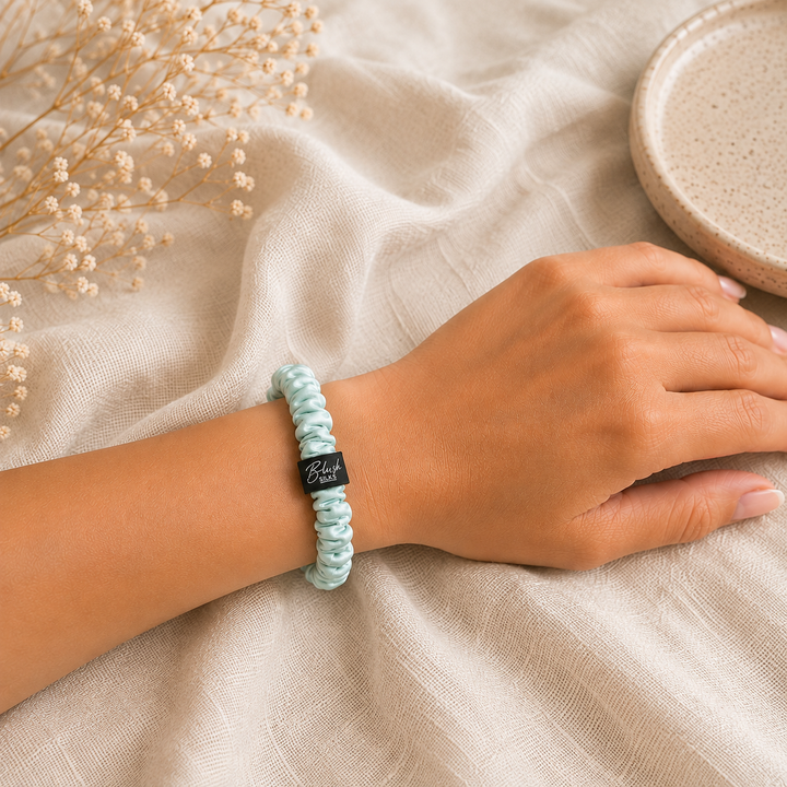 Mint Green 100% mulberry silk mini scrunchie worn on wrist
