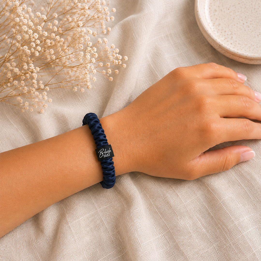 Navy Blue 100% mulberry silk mini scrunchie worn on wrist