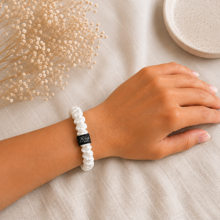Pearl White 100% mulberry silk mini scrunchie worn on wrist