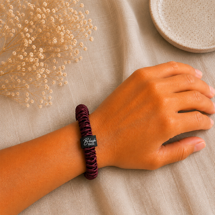 Sangria 100% mulberry silk mini scrunchie worn on wrist