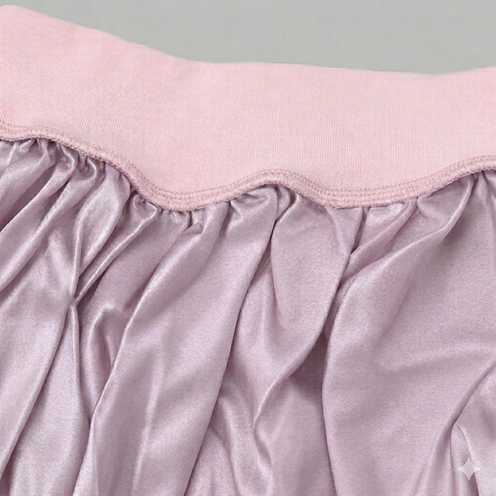 Inside view of dusty rose mulberry silk sleep bonnet showing smooth silk lining designed to protect hair, reduce frizz, and help retain moisture by Blush Silks Canada